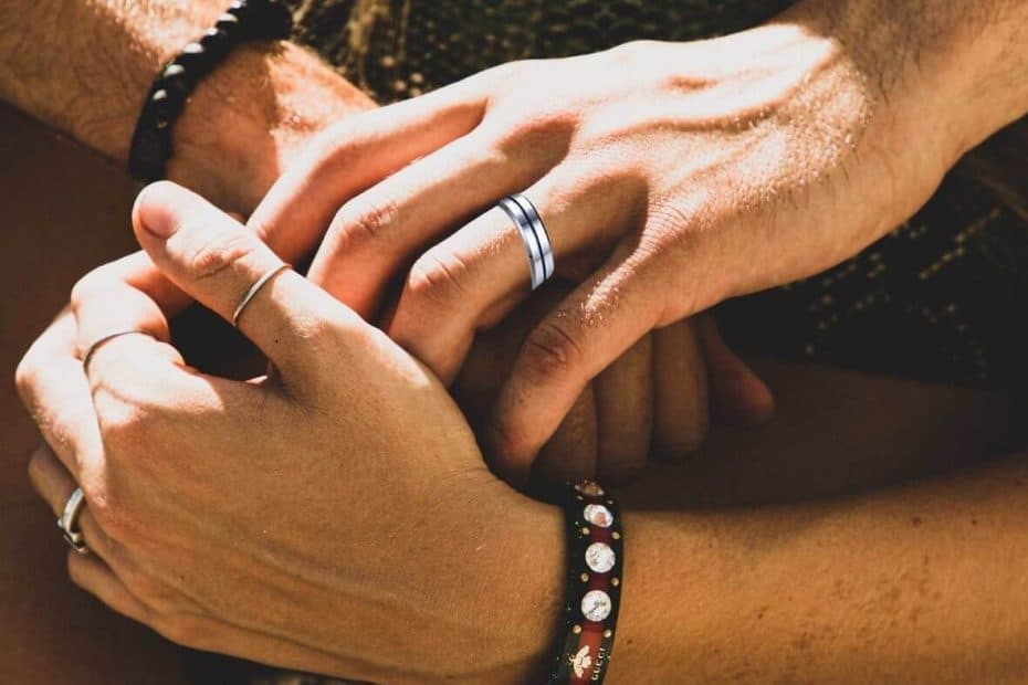 Couple holding hands